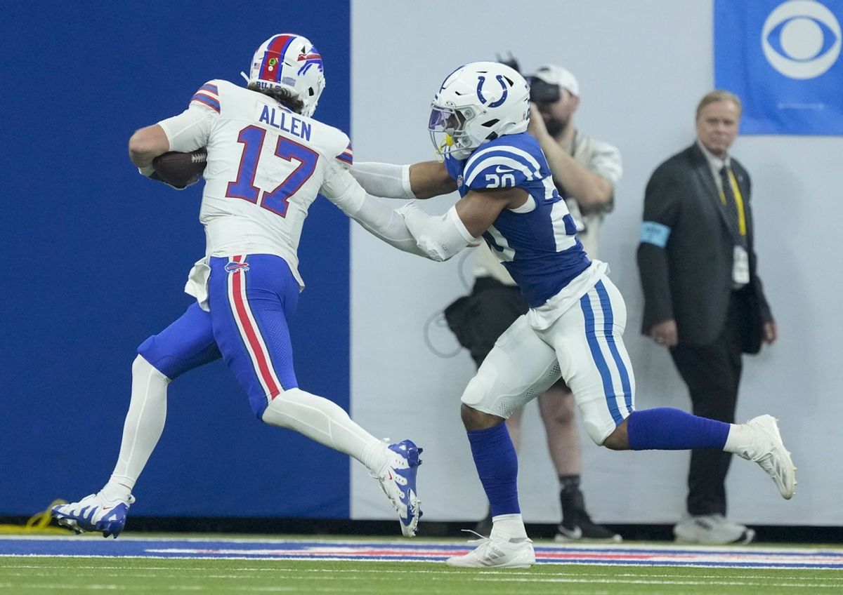 Nov 10, 2024; Indianapolis, Indiana, USA; Indianapolis Colts safety Nick Cross (20) chases Buffalo Bills quarterback Josh Allen (17) into the end zone Sunday, Nov. 10, 2024, during a game at Lucas Oil Stadium in Indianapolis. Mandatory Credit: Grace Hollars-USA TODAY Network via Imagn Images