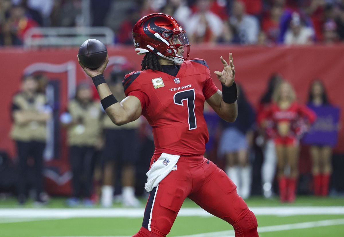 Nov 10, 2024; Houston, Texas, USA; Houston Texans quarterback C.J. Stroud (7) attempts a pass during the second quarter against the Detroit Lions at NRG Stadium. Mandatory Credit: Troy Taormina-Imagn Images