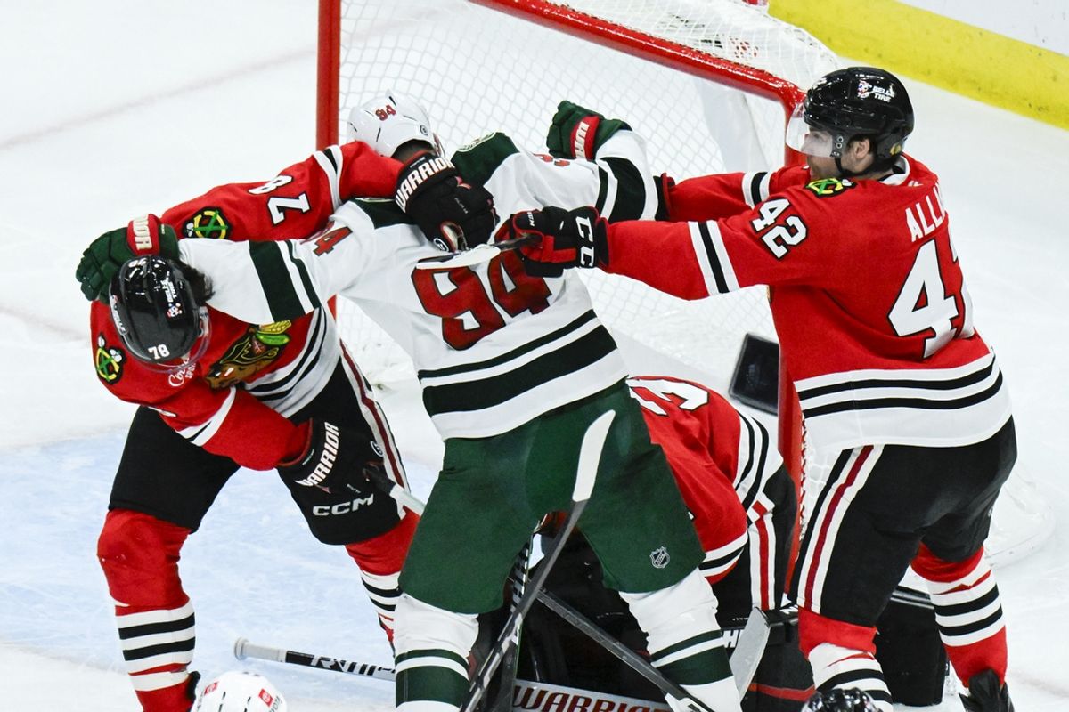 Nov 10, 2024; Chicago, Illinois, USA;  Minnesota Wild center Jakub Lauko (94) fights with Chicago Blackhawks defenseman TJ Brodie (78) and  defenseman Nolan Allan (42) during the third  period at the United Center. Mandatory Credit: Matt Marton-Imagn Images