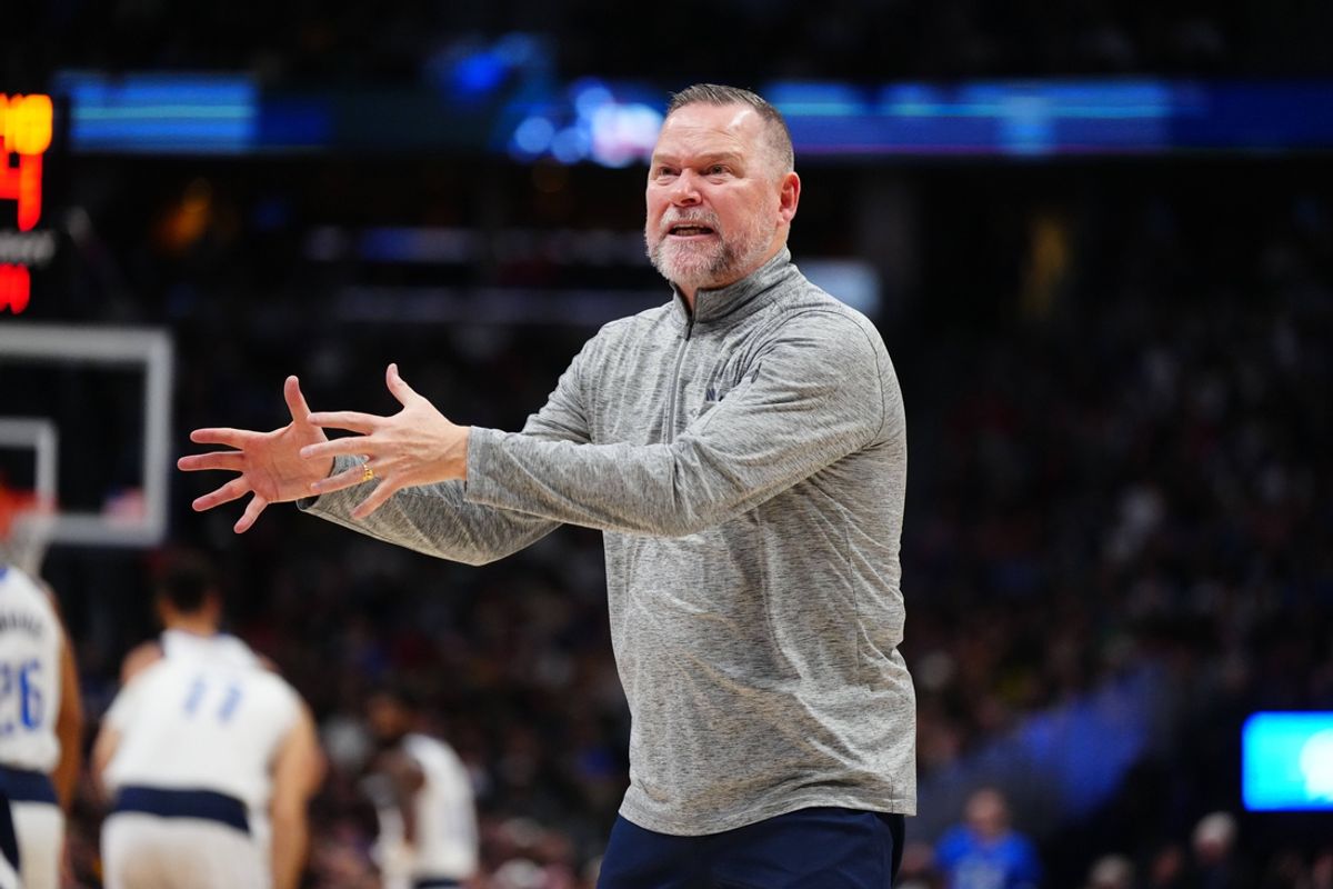 Nov 10, 2024; Denver, Colorado, USA; Denver Nuggets head coach Michael Malone reacts in the third quarter against the Dallas Mavericks at Ball Arena. Mandatory Credit: Ron Chenoy-Imagn Images