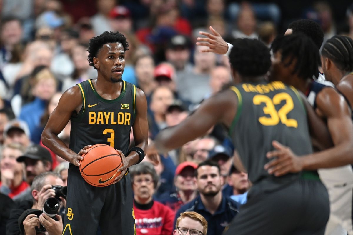 Nov 4, 2024; Spokane, Washington, USA; Baylor Bears guard Jeremy Roach (3) inbounds the ball against the Gonzaga Bulldogs in the first half at Spokane Arena. Mandatory Credit: James Snook-Imagn Images