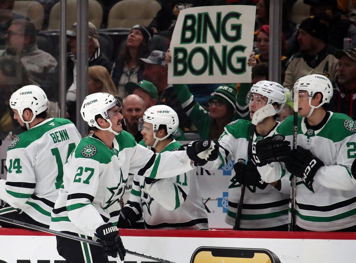 Nov 11, 2024; Pittsburgh, Pennsylvania, USA;  Dallas Stars left wing Mason Marchment (27) celebrates his goal with the Dallas Stars bench against the Pittsburgh Penguins during the first period at PPG Paints Arena. Mandatory Credit: Charles LeClaire-Imagn Images