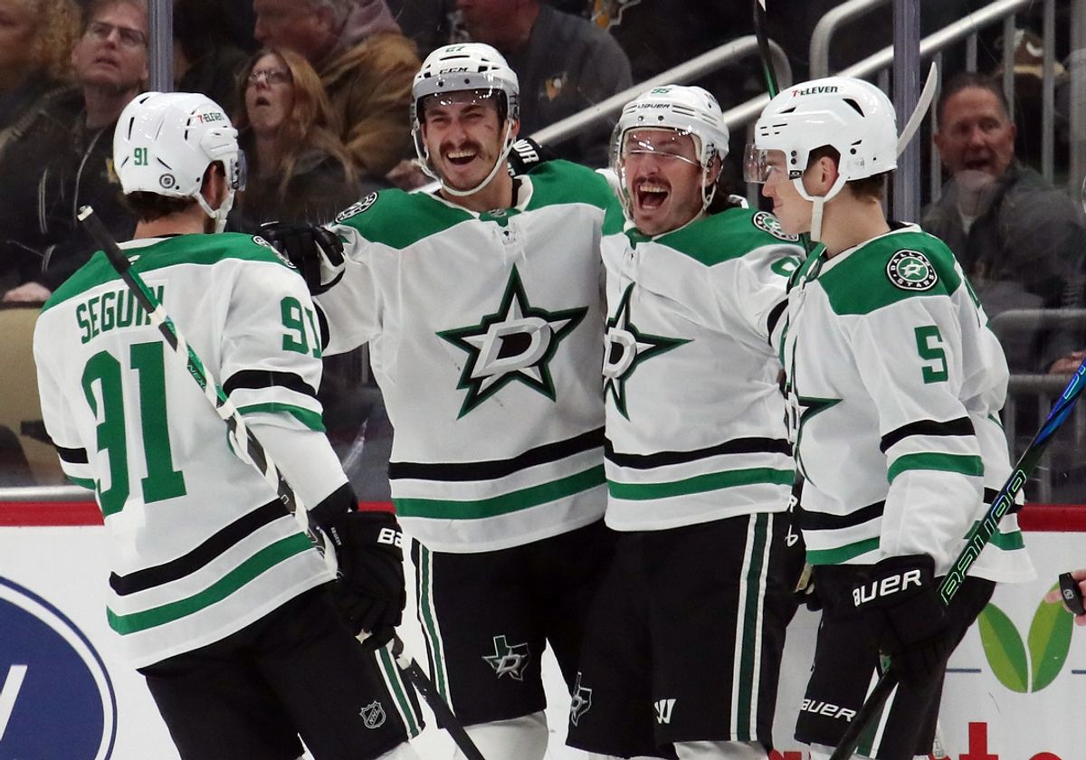 Nov 11, 2024; Pittsburgh, Pennsylvania, USA;  Dallas Stars center Tyler Seguin (91) and center Matt Duchene (RC) and defenseman Nils Lundkvist (5) congratulate left wing Mason Marchment (LC) on his goal against the Pittsburgh Penguins during the first period at PPG Paints Arena. Mandatory Credit: Charles LeClaire-Imagn Images