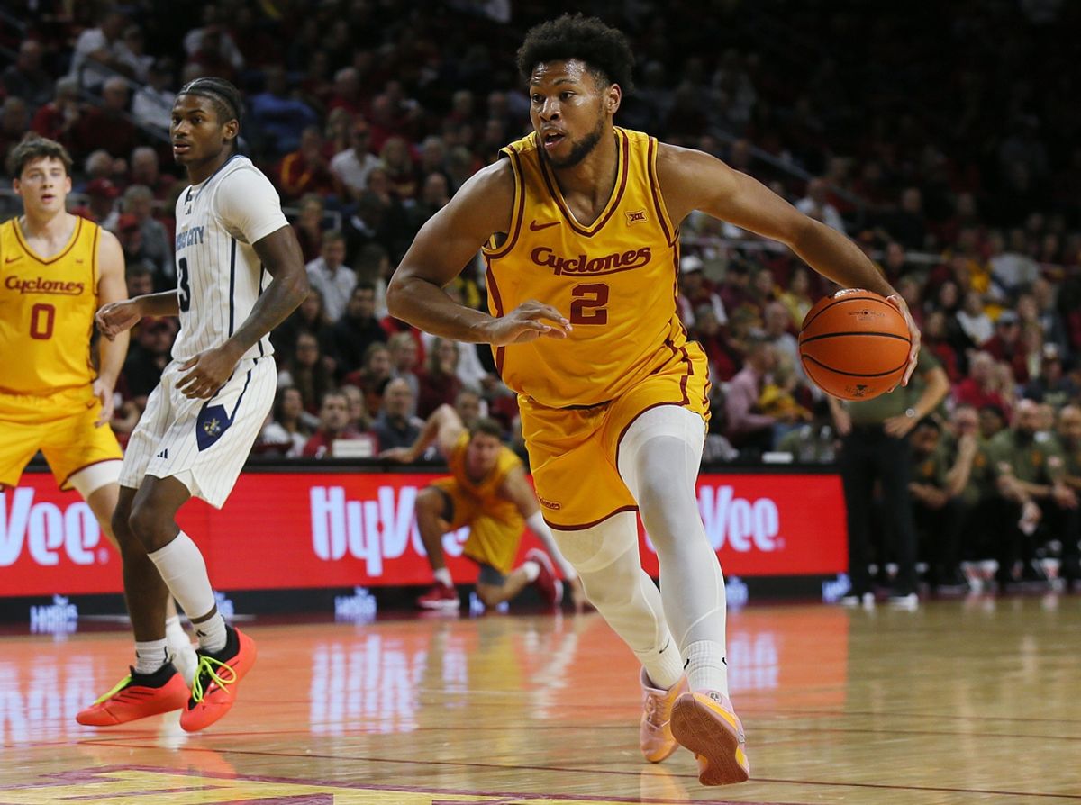 Iowa State cyclones forward Joshua Jefferson (2) drives to the basket around Kansas City Roos' point guard Davontae Hall (3) during the first half in the NCAA men’s basketball at Hilton Coliseum on Monday, Nov. 11, 2024, in Ames, Iowa.