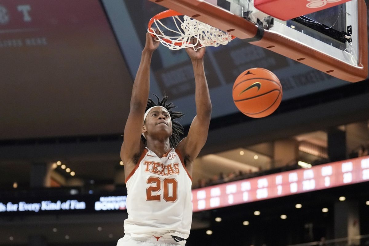 Nov 12, 2024; Austin, Texas, USA; Texas Longhorns guard Tre Johnson (20) dunks during the first half against Chicago State Cougars at Moody Center. Mandatory Credit: Scott Wachter-Imagn Images