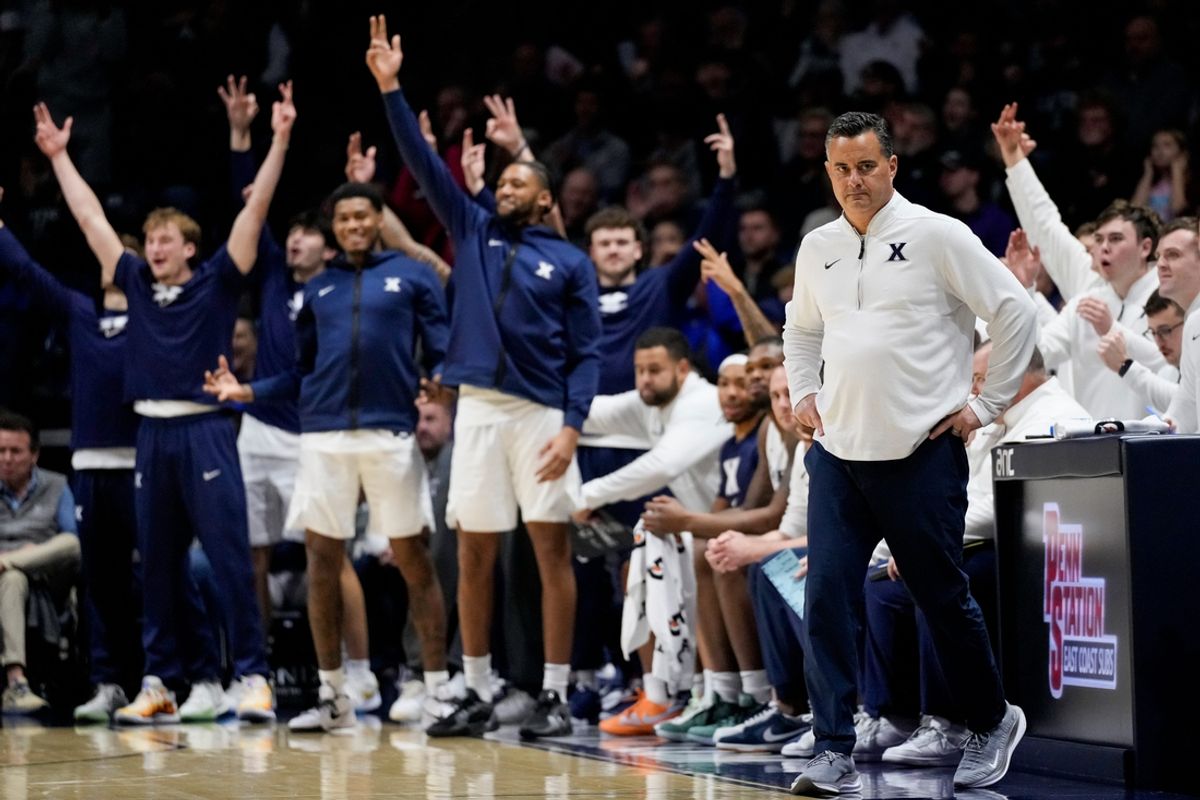 Xavier Musketeers head coach Sean Miller rises as his bench celebrates a three pointer in the first half of the NCAA Men’s Basketball game between the Xavier Musketeers and the Jackson State Tigers at the Cintas Center at Xavier University in Cincinnati on Tuesday, Nov. 12, 2024. Xavier led 40-25 at halftime.