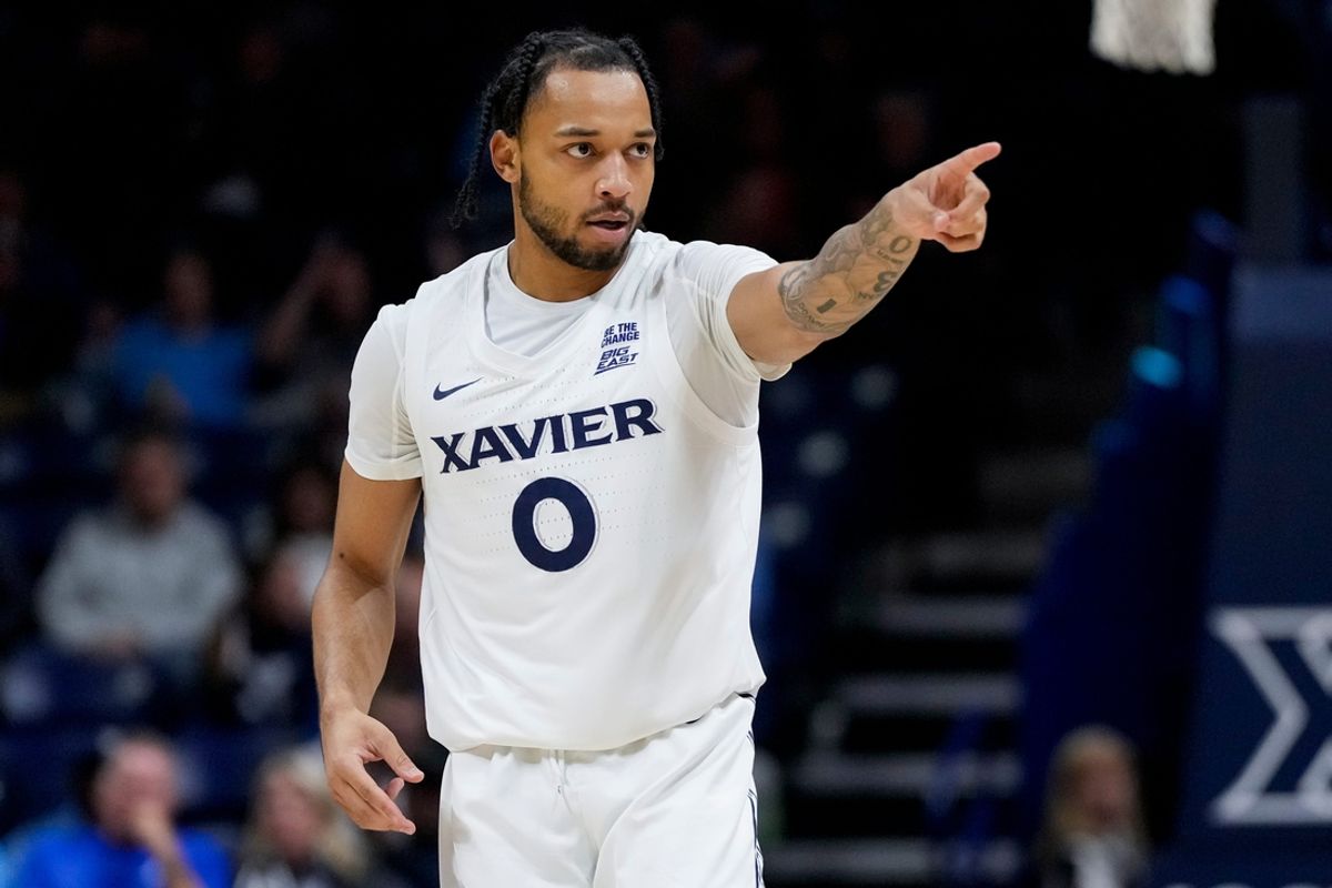 Xavier Musketeers guard Trey Green (0) celebrates a three point basket in the first half of the NCAA Men’s Basketball game between the Xavier Musketeers and the Jackson State Tigers at the Cintas Center at Xavier University in Cincinnati on Tuesday, Nov. 12, 2024. Xavier led 40-25 at halftime.