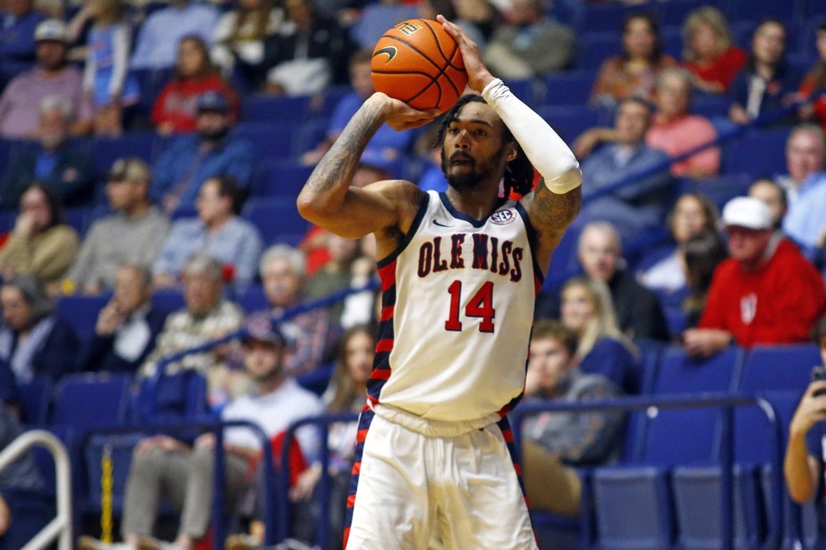 Nov 12, 2024; Oxford, Mississippi, USA; Mississippi Rebels guard Dre Davis (14) shoots during the first half against the South Alabama Jaguars at C.M. 'Tad' Smith Coliseum. Mandatory Credit: Petre Thomas-Imagn Images