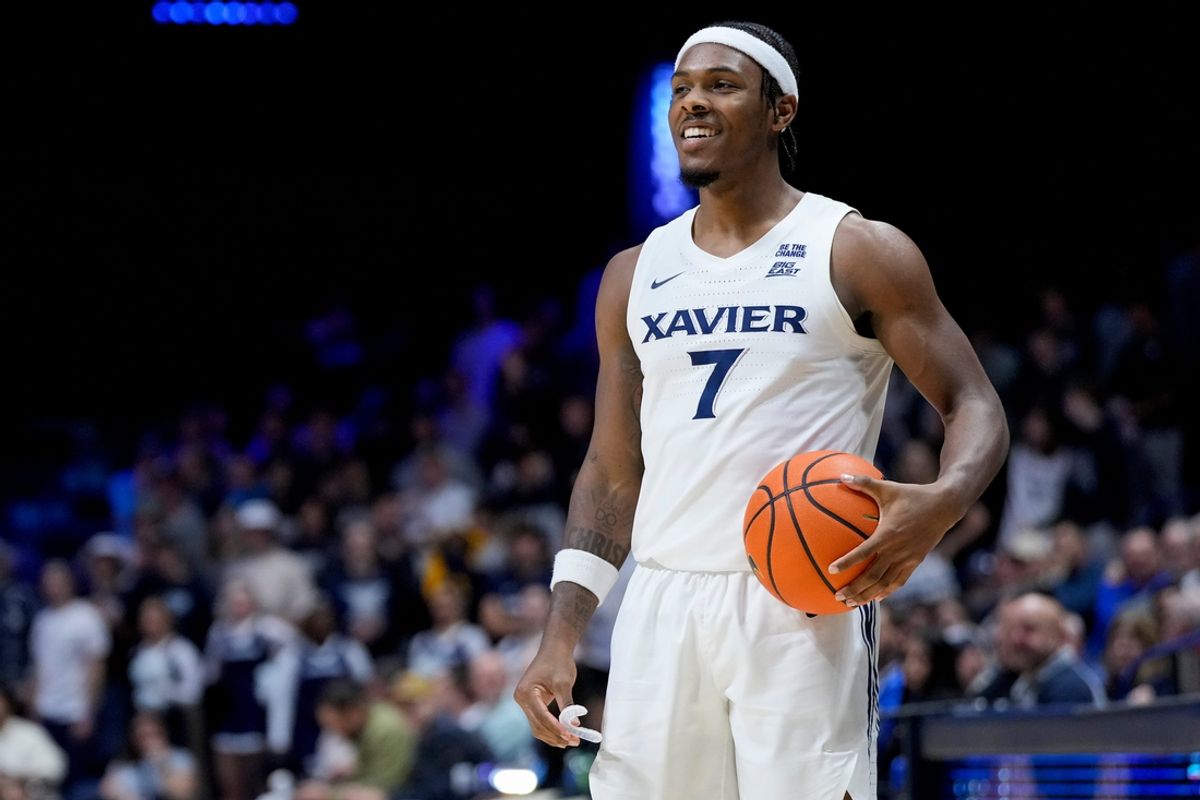 Xavier Musketeers guard Ryan Conwell (7) smiles as he picks up the ball in a timeout in the second half of the NCAA Men’s Basketball game between the Xavier Musketeers and the Jackson State Tigers at the Cintas Center at Xavier University in Cincinnati on Tuesday, Nov. 12, 2024. Xavier won 94-57.