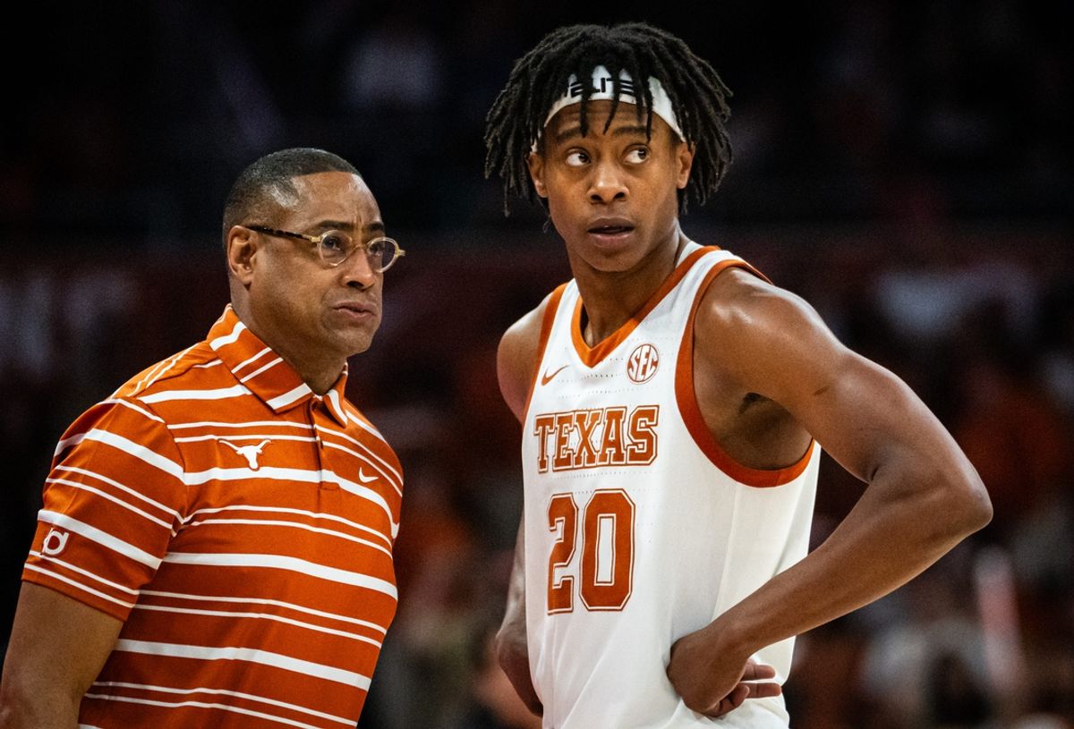 Texas Longhorns head coach Rodney Terry speaks with guard Tre Johnson (20) during a break in the second half of the Longhorns' game against the Chicago State Cougars at the Moody Center in Austin, Nov. 12, 2024.