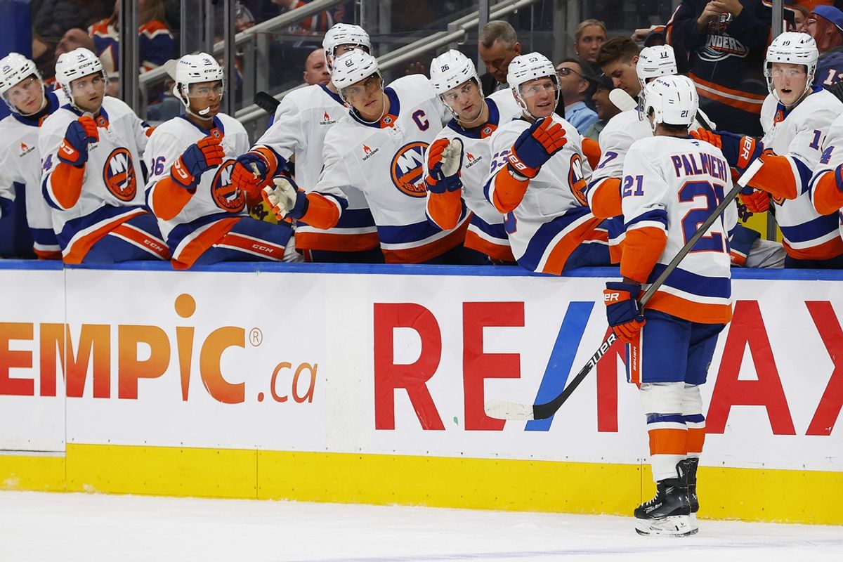 Nov 12, 2024; Edmonton, Alberta, CAN; The New York Islanders celebrate a goal scored by forward Kyle Palmieri (21) during the second period against the Edmonton Oilers at Rogers Place. Mandatory Credit: Perry Nelson-Imagn Images