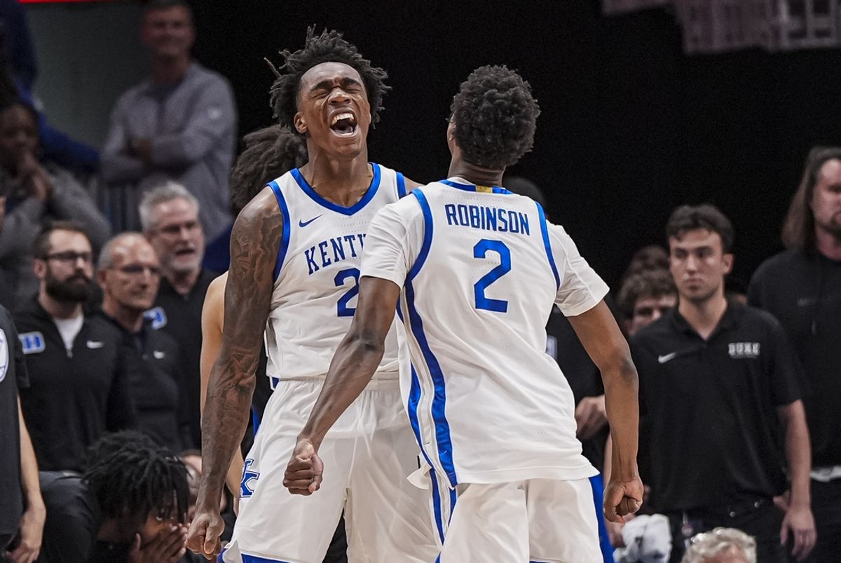 Nov 12, 2024; Atlanta, Georgia, USA; Kentucky Wildcats center Amari Williams (22) reacts with guard Jaxson Robinson (2) against the Duke Blue Devils during the second half at State Farm Arena. Mandatory Credit: Dale Zanine-Imagn Images
