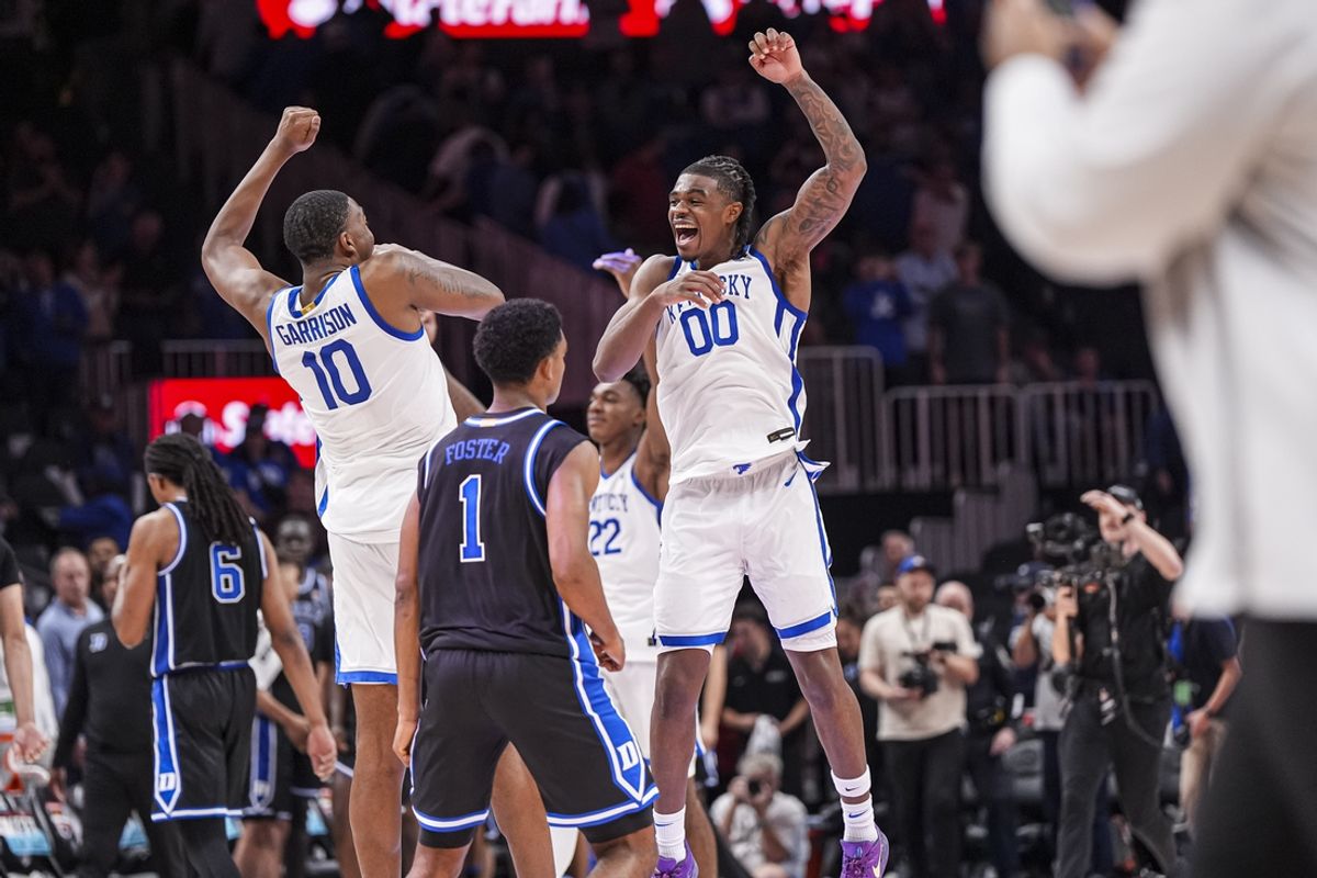 Nov 12, 2024; Atlanta, Georgia, USA; Kentucky Wildcats players react after defeating the Duke Blue Devils at State Farm Arena. Mandatory Credit: Dale Zanine-Imagn Images