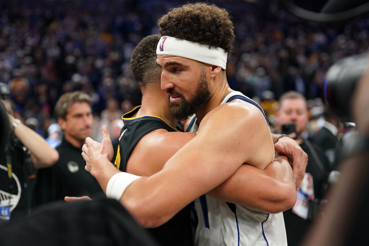 Nov 12, 2024; San Francisco, California, USA; Dallas Mavericks guard Klay Thompson (31) hugs Golden State Warriors guard Stephen Curry (30) after a game at the Chase Center. Mandatory Credit: Cary Edmondson-Imagn Images
