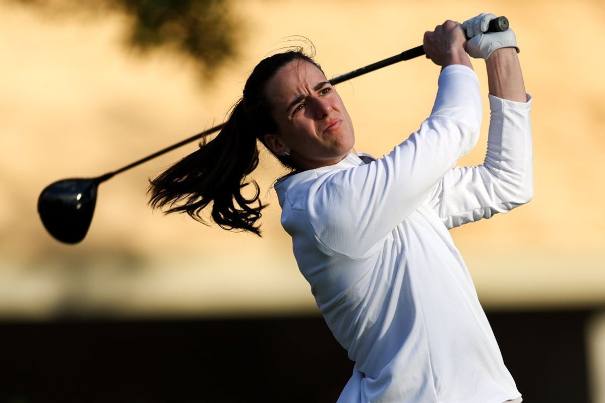 Nov 13, 2024; Belleair, Florida, USA; Indiana Fever guard Caitlin Clark (22) tees off during The Annika golf tournament Pro Am at Pelican Golf Club. Mandatory Credit: Nathan Ray Seebeck-Imagn Images