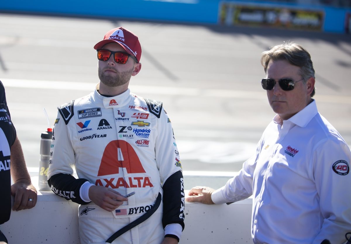 Nov 10, 2024; Avondale, Arizona, USA; NASCAR Cup Series driver William Byron (left) with Jeff Gordon during the NASCAR Cup Series Championship race at Phoenix Raceway. Mandatory Credit: Mark J. Rebilas-Imagn Images