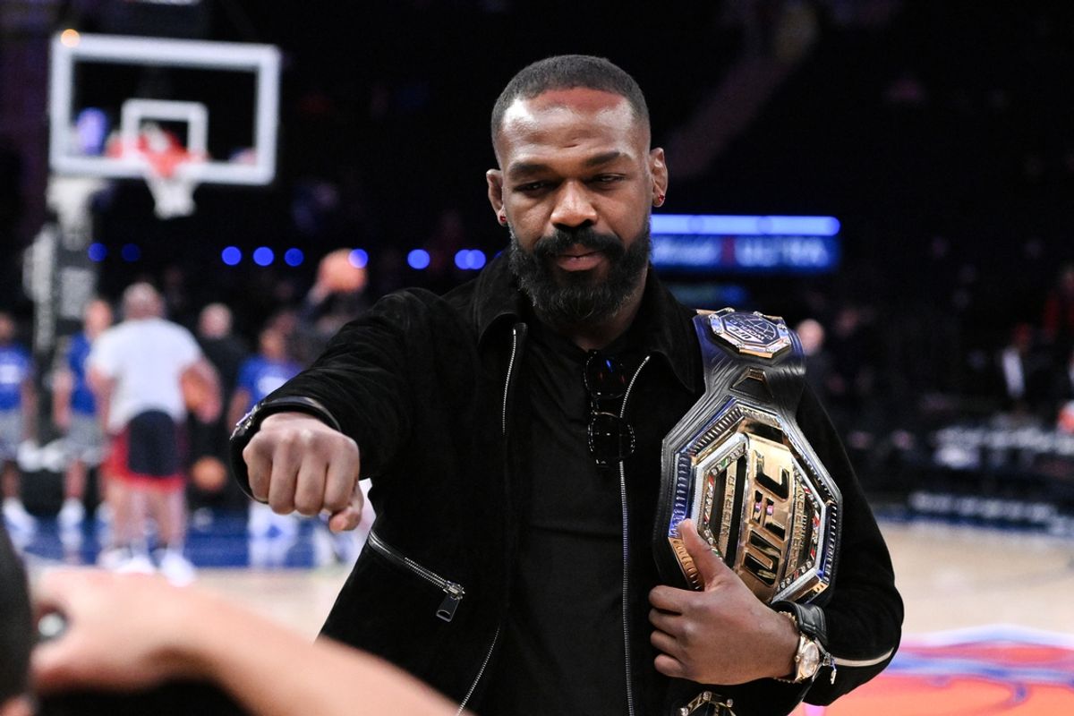 Nov 13, 2024; New York, New York, USA; UFC mixed martial arts heavyweight champion Jon Jones poses for a photo before a game between the New York Knicks and the Chicago Bulls at Madison Square Garden. Mandatory Credit: John Jones-Imagn Images