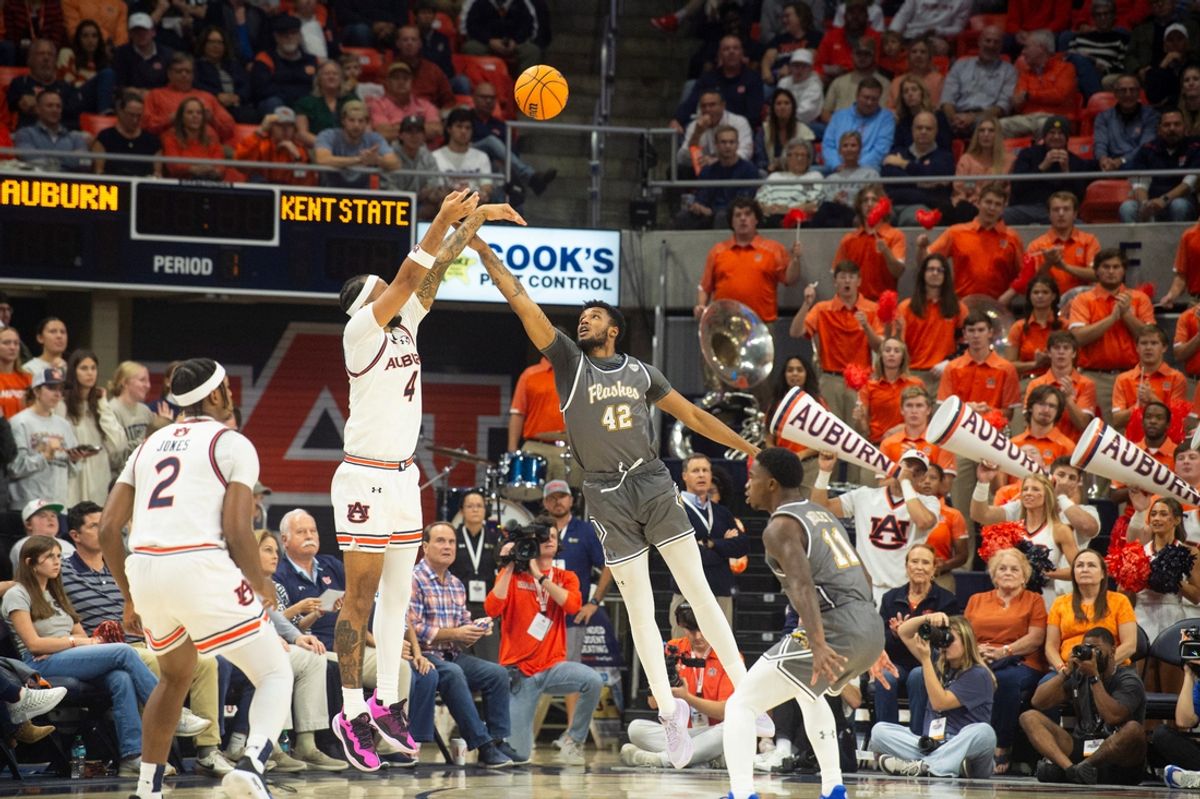 Auburn Tigers forward Johni Broome (4) shoots a jump shot as Auburn Tigers take on Kent State Golden Flashes at Neville Arena in Auburn, Ala., on Saturday, Nov. 13, 2024.