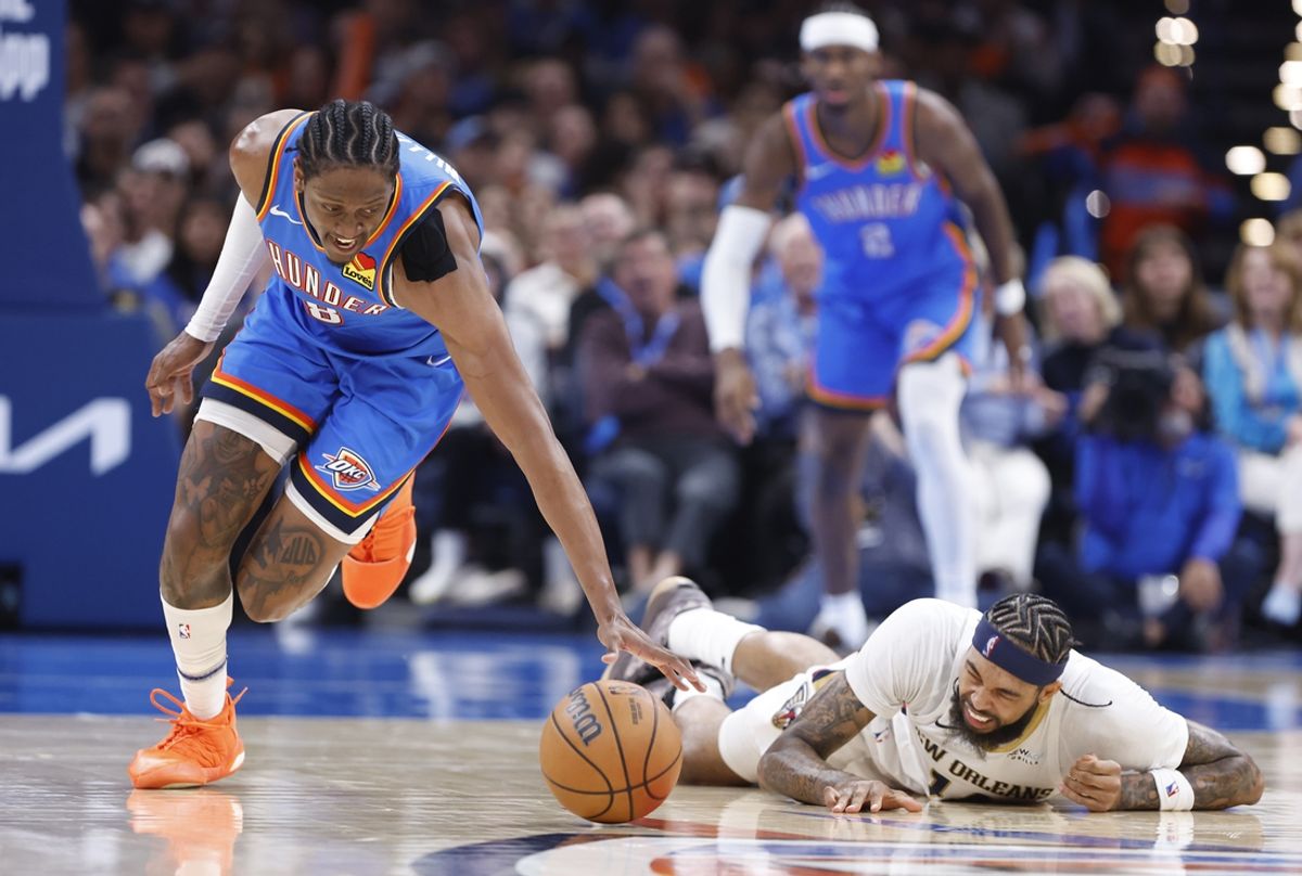 Nov 13, 2024; Oklahoma City, Oklahoma, USA; Oklahoma City Thunder forward Jalen Williams (8) and New Orleans Pelicans forward Brandon Ingram (14) fight for a loose ball during the second quarter at Paycom Center. Mandatory Credit: Alonzo Adams-Imagn Images