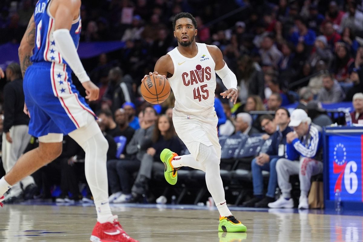 Nov 13, 2024; Philadelphia, Pennsylvania, USA; Cleveland Cavaliers guard Donovan Mitchell (45) controls the ball against the Philadelphia 76ers in the third quarter at Wells Fargo Center. Mandatory Credit: Kyle Ross-Imagn Images