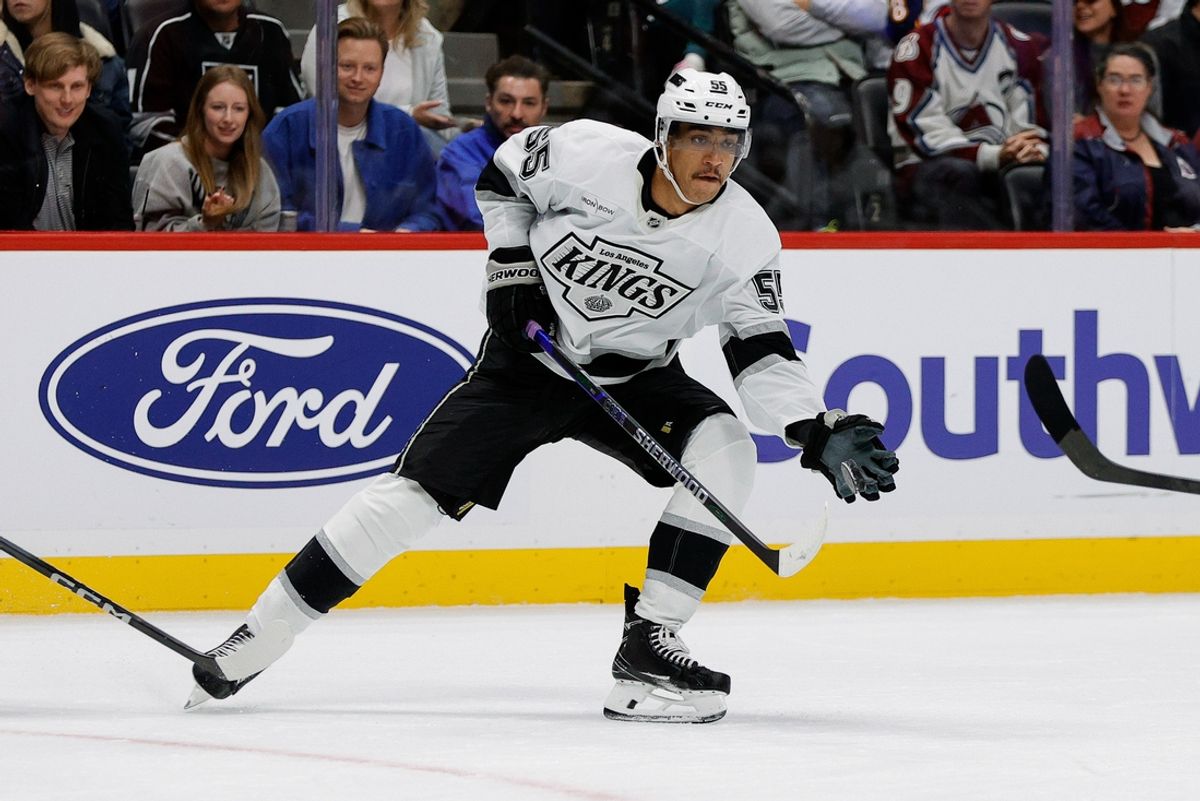 Nov 13, 2024; Denver, Colorado, USA; Los Angeles Kings right wing Quinton Byfield (55) controls the puck in the first period against the Colorado Avalanche at Ball Arena. Mandatory Credit: Isaiah J. Downing-Imagn Images