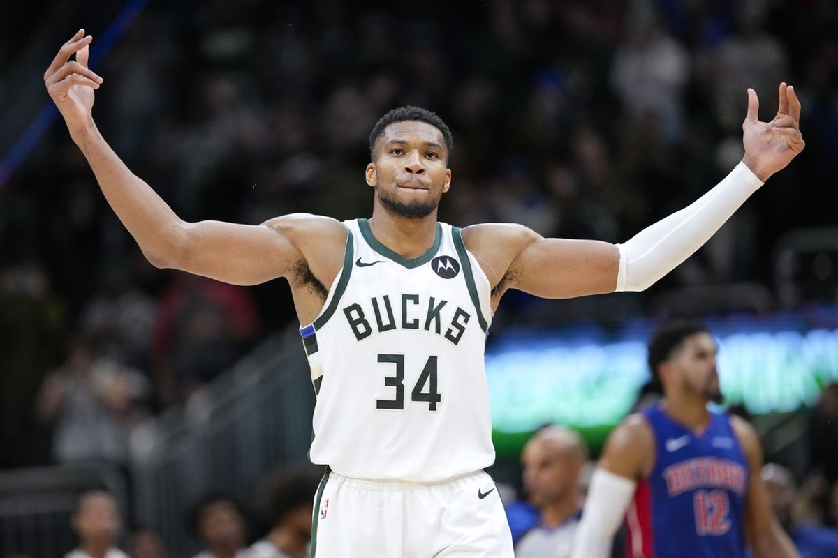 Nov 13, 2024; Milwaukee, Wisconsin, USA;  Milwaukee Bucks forward Giannis Antetokounmpo (34) celebrates following the game against the Detroit Pistons at Fiserv Forum. Mandatory Credit: Jeff Hanisch-Imagn Images