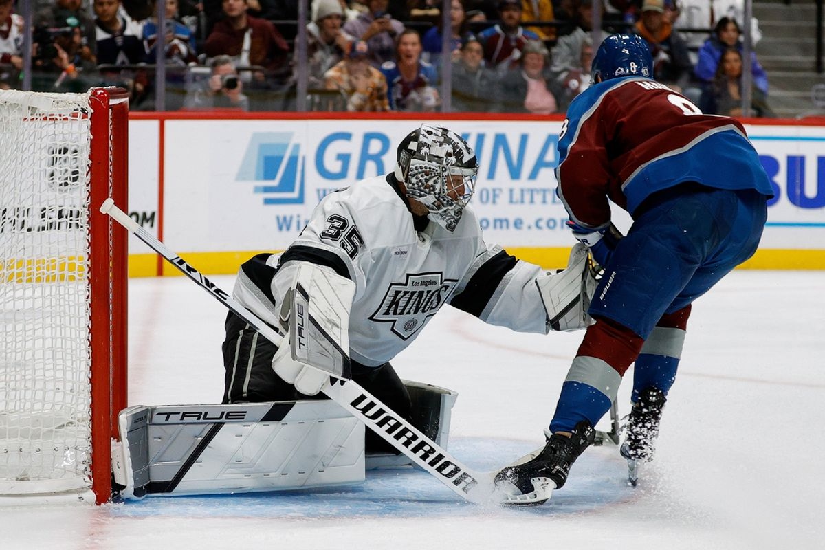 Nov 13, 2024; Denver, Colorado, USA; Los Angeles Kings goaltender Darcy Kuemper (35) defends against Colorado Avalanche defenseman Cale Makar (8) in the second period at Ball Arena. Mandatory Credit: Isaiah J. Downing-Imagn Images