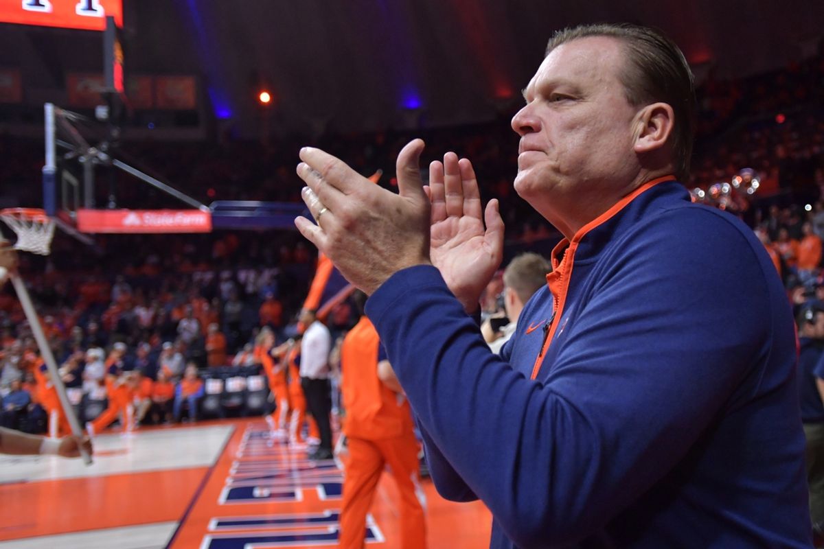 Nov 13, 2024; Champaign, Illinois, USA;  Illinois Fighting Illini head coach Brad Underwood applauds the crowd before a against the Oakland Golden Grizzlies at State Farm Center. Mandatory Credit: Ron Johnson-Imagn Images
