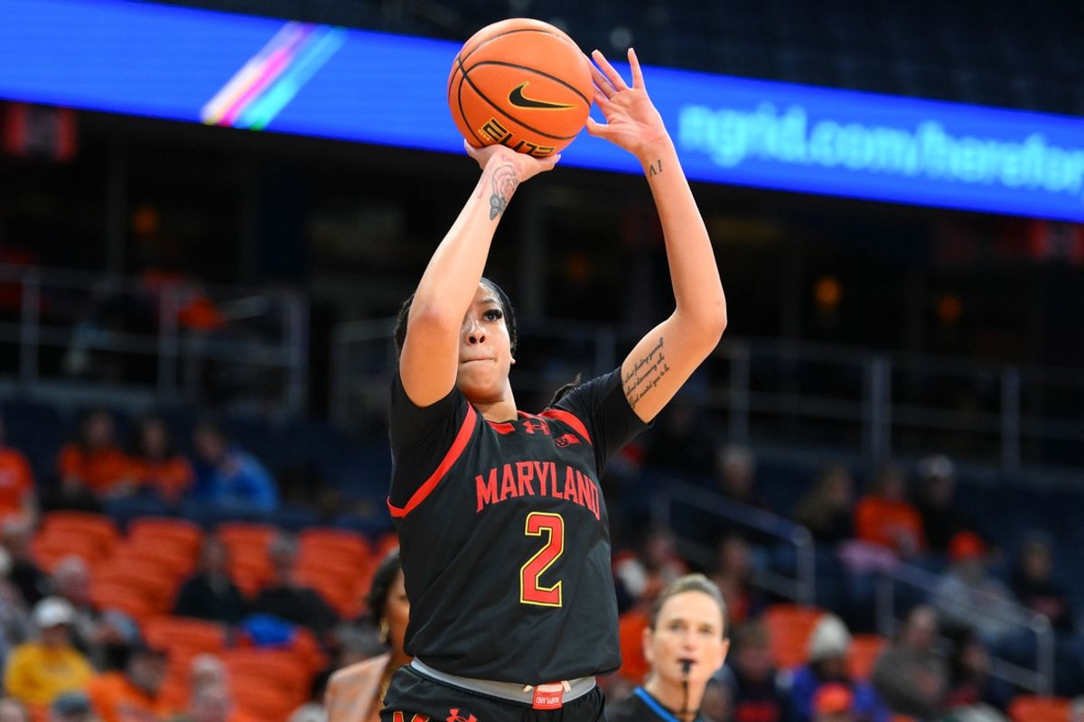 Nov 13, 2024; Syracuse, New York, USA; Maryland Terrapins guard Kaylene Smikle (2) shoots the ball against the Syracuse Orange during the first half at the JMA Wireless Dome. Mandatory Credit: Rich Barnes-Imagn Images