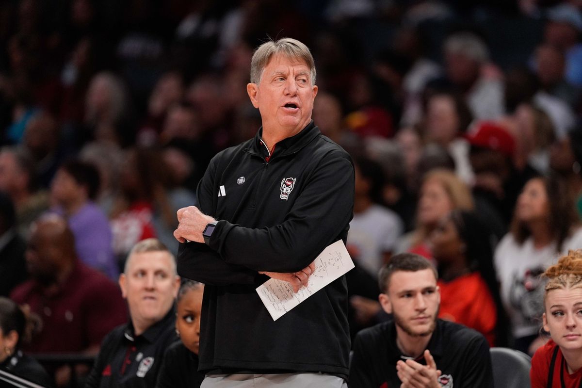 Nov 10, 2024; Charlotte, NC, USA; NC State Wolfpack head coach Wes Moore during the first half of the Ally Tip Off at Spectrum Center. Mandatory Credit: Jim Dedmon-Imagn Images