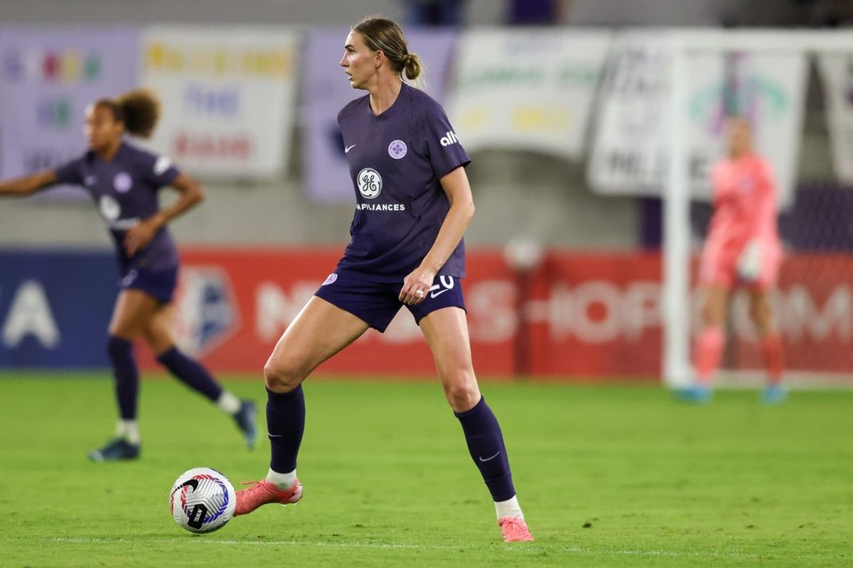 Nov 3, 2024; Louisville, Kentucky, USA;  Racing Louisville FC midfielder Taylor Flint (26) maneuvers the ball during the first half against San Diego Wave FC at Lynn Family Stadium. Mandatory Credit: EM Dash-Imagn Images