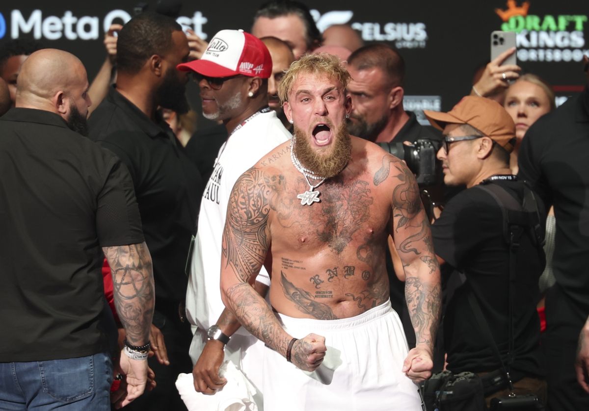 Nov 14, 2024; Irving, TX, USA;  Jake Paul reacts after being slapped by Mike Tyson (not pictured) after the weigh-in at the Toyota Music Factory.  Mandatory Credit: Kevin Jairaj-Imagn Images