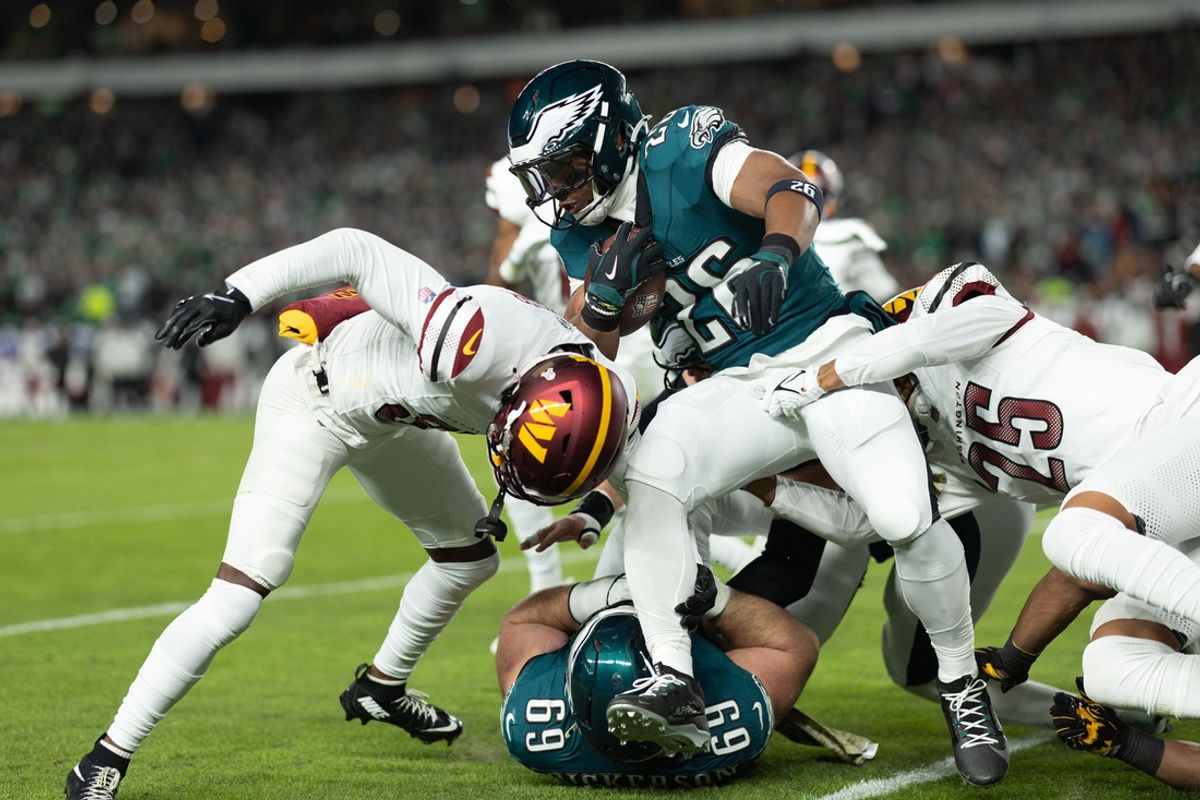 Nov 14, 2024; Philadelphia, Pennsylvania, USA; Philadelphia Eagles running back Saquon Barkley (26) runs with the ball against the Washington Commanders during the first quarter at Lincoln Financial Field. Mandatory Credit: Bill Streicher-Imagn Images