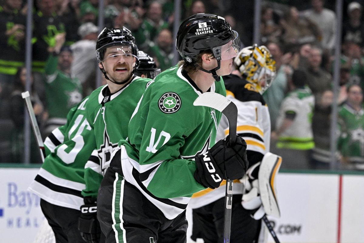 Nov 14, 2024; Dallas, Texas, USA; Dallas Stars center Oskar Back (10) and center Colin Blackwell (15) and center Sam Steel (18) celebrates after Back scores his first career NHL goal during the second period against the Boston Bruins at the American Airlines Center. Mandatory Credit: Jerome Miron-Imagn Images