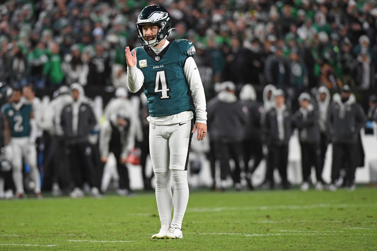 Philadelphia Eagles place kicker Jake Elliott (4) lines up a field goal against the Washington Commanders during the second quarter at Lincoln Financial Field. Mandatory Credit: Eric Hartline-Imagn Images