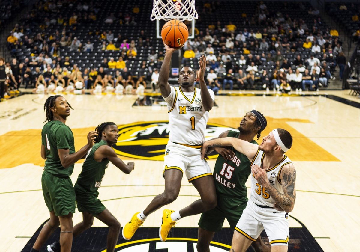 Nov 14, 2024; Columbia, Missouri, USA; Missouri Tigers guard Marques Warrick (1) shoots the ball during the first half against the Mississippi Valley State Delta Devils at Mizzou Arena. Mandatory Credit: Jay Biggerstaff-Imagn Images