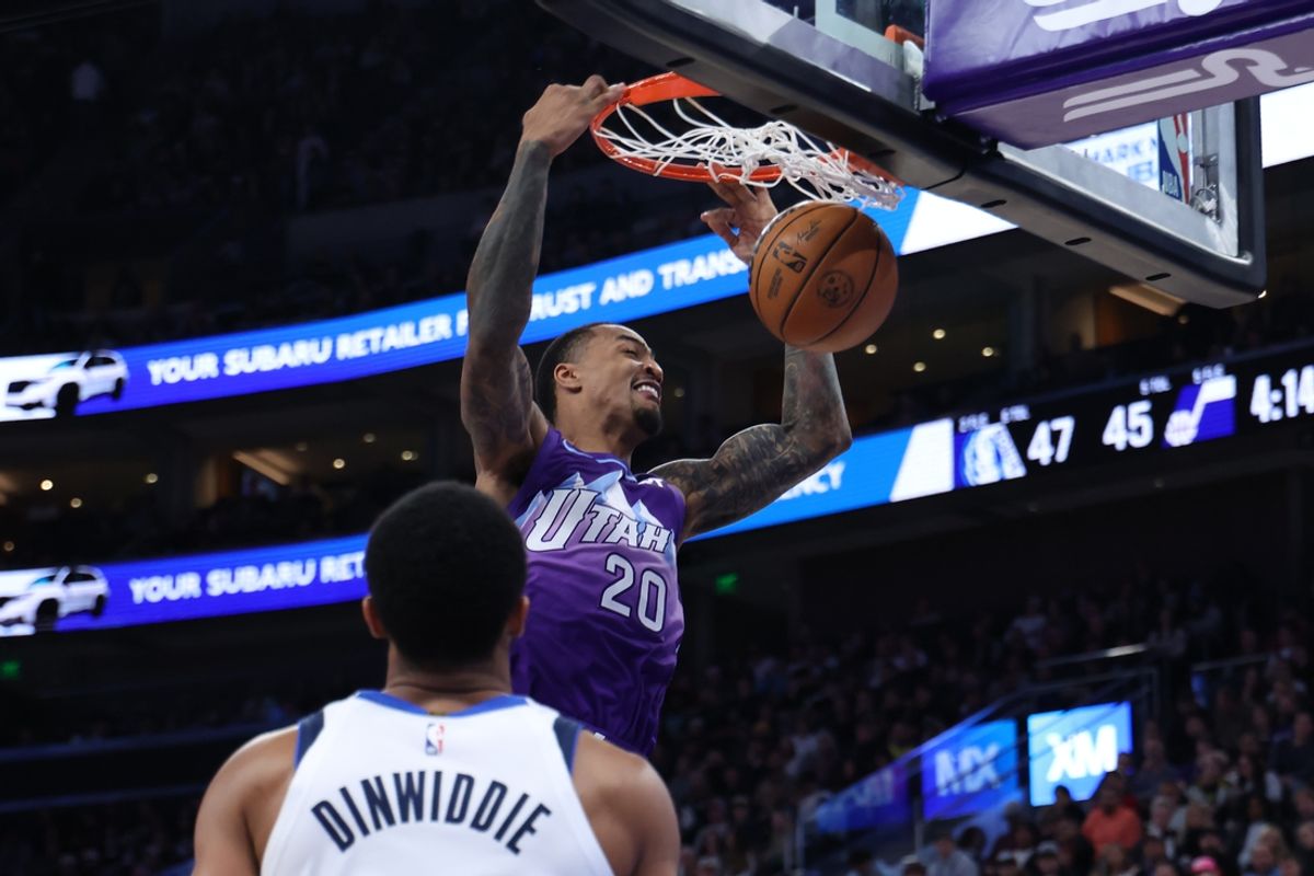 Nov 14, 2024; Salt Lake City, Utah, USA; Utah Jazz forward John Collins (20) dunks the ball against the Dallas Mavericks during the second quarter at Delta Center. Mandatory Credit: Rob Gray-Imagn Images