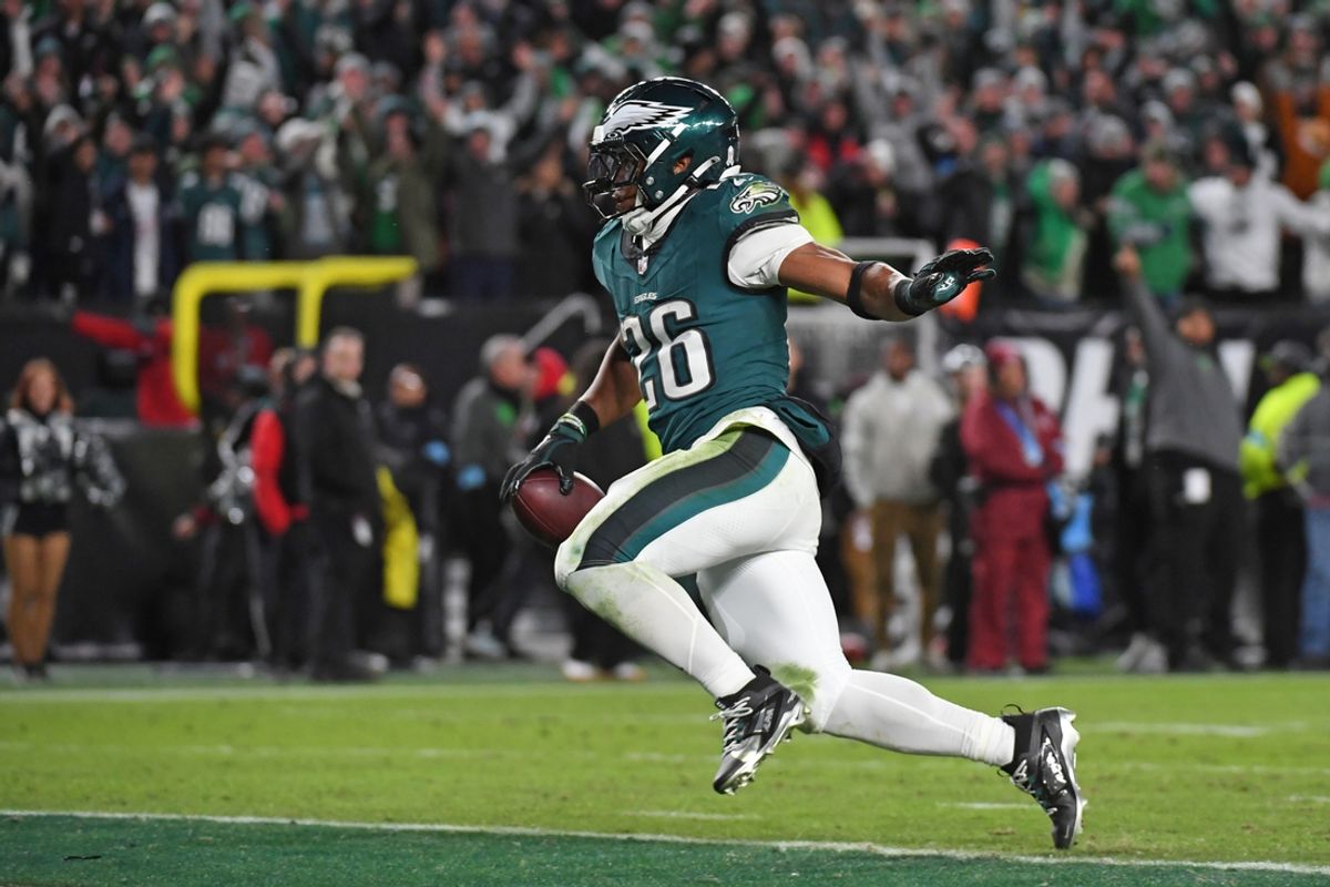 Nov 14, 2024; Philadelphia, Pennsylvania, USA; Philadelphia Eagles running back Saquon Barkley (26) scores on a 39-yard touchdown run during the fourth quarter against the Washington Commanders at Lincoln Financial Field. Mandatory Credit: Eric Hartline-Imagn Images