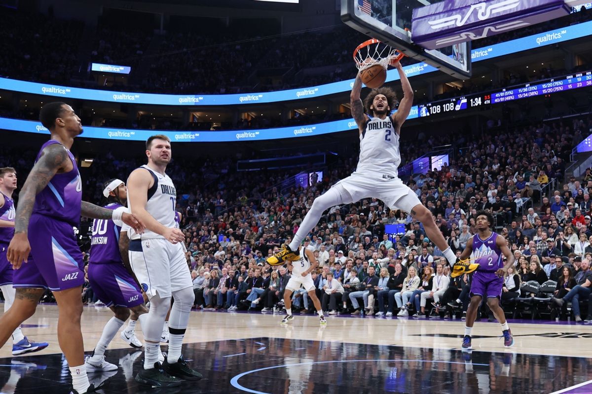 Nov 14, 2024; Salt Lake City, Utah, USA; Dallas Mavericks center Dereck Lively II (2) dunks the ball against the Utah Jazz during the fourth quarter at Delta Center. Mandatory Credit: Rob Gray-Imagn Images