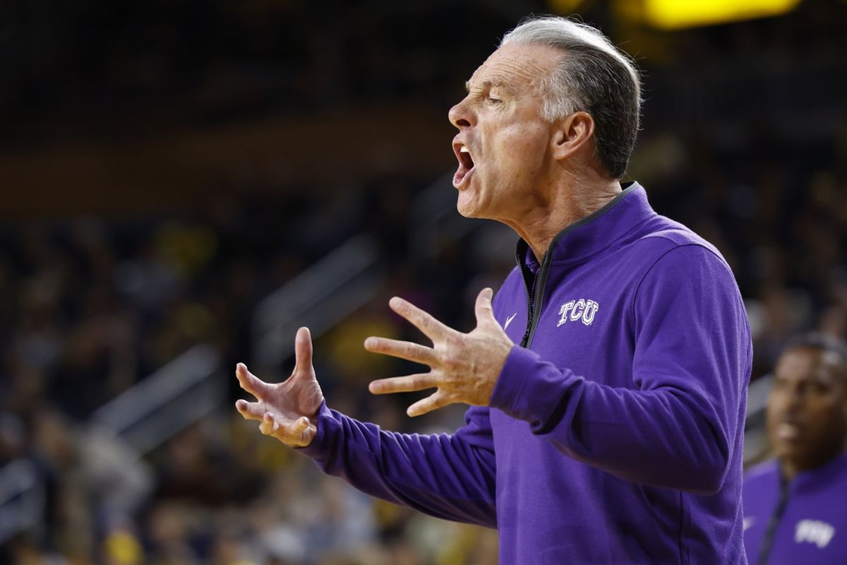 Nov 15, 2024; Ann Arbor, Michigan, USA;  TCU Horned Frogs head coach Jamie Dixon reacts during the first half against the Michigan Wolverines at Crisler Center. Mandatory Credit: Rick Osentoski-Imagn Images
