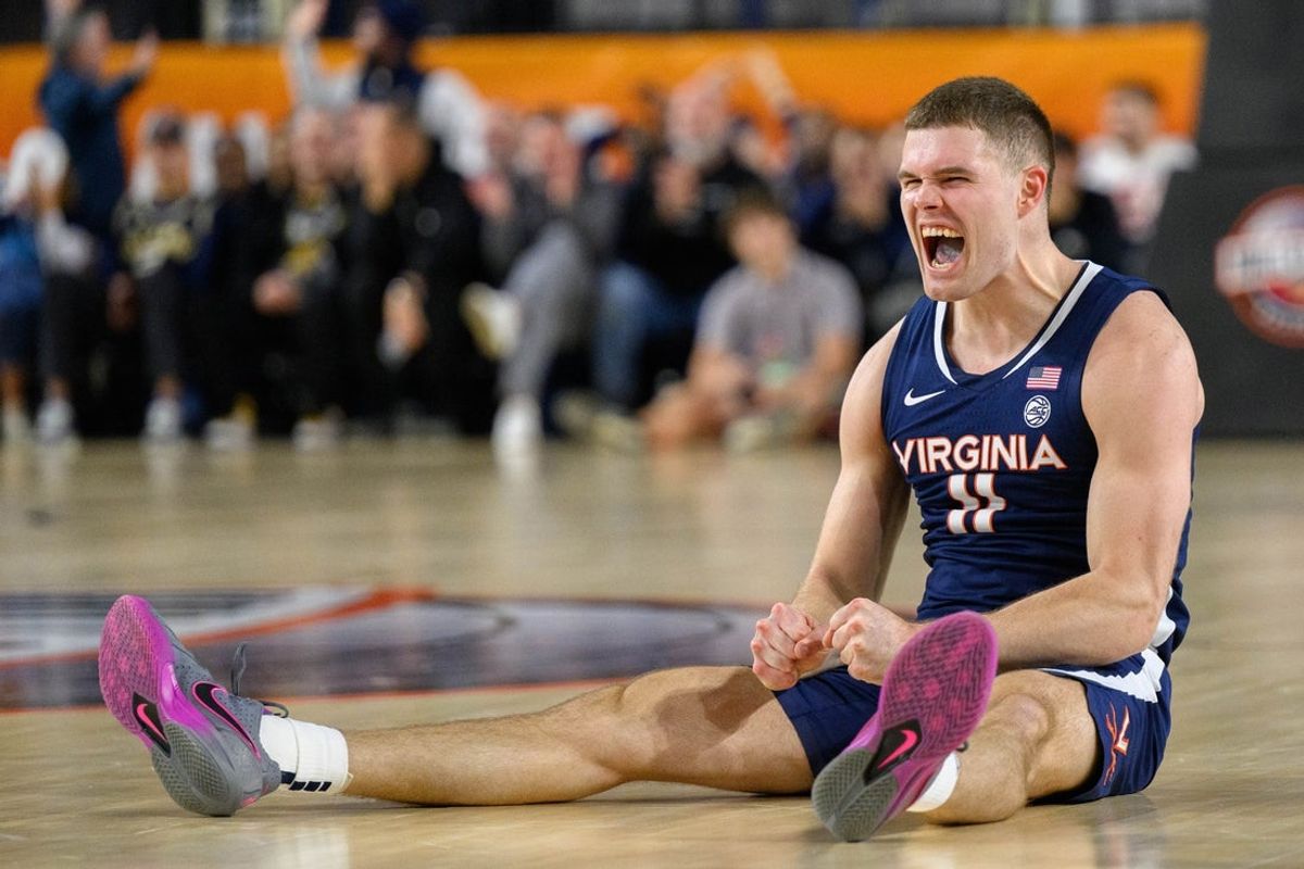 Nov 15, 2024; Baltimore, Maryland, USA; Virginia Cavaliers guard Isaac McKneely (11) reacts after making a shot during the second half against the Villanova Wildcats at CFG Bank Arena. Mandatory Credit: Reggie Hildred-Imagn Images