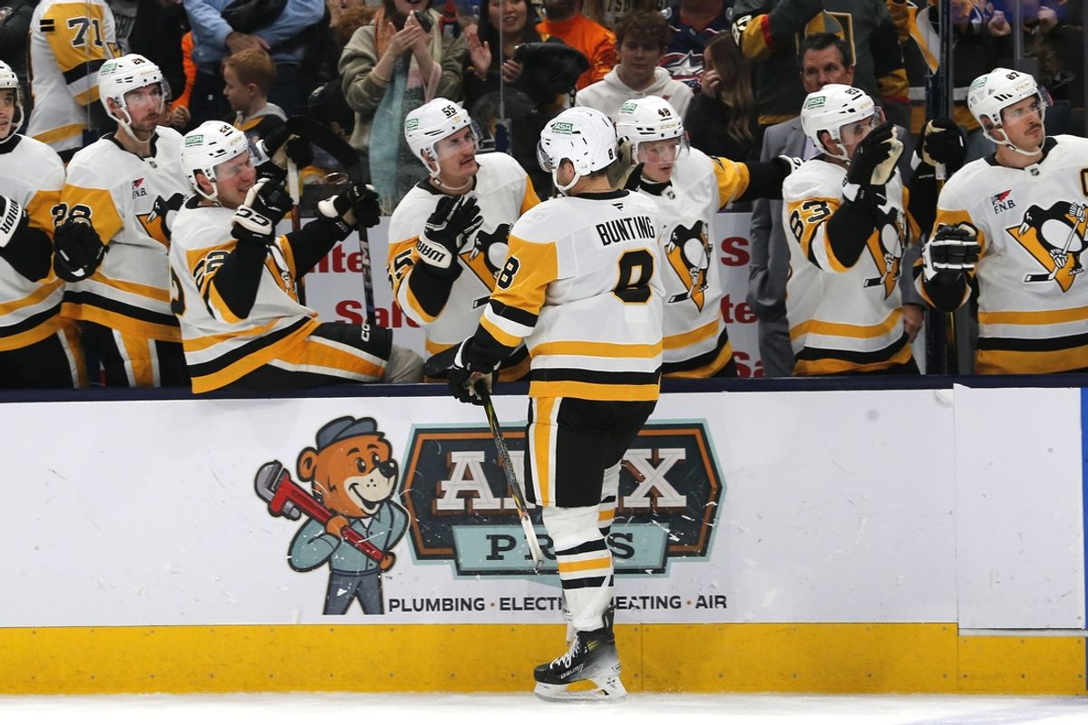Nov 15, 2024; Columbus, Ohio, USA; Pittsburgh Penguins left wing Michael Bunting (8) celebrates his goal against the Columbus Blue Jackets during the second period at Nationwide Arena. Mandatory Credit: Russell LaBounty-Imagn Images