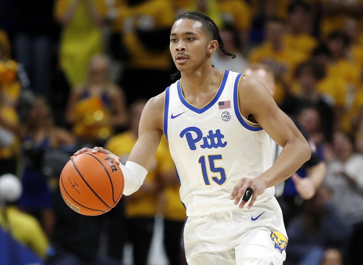 Nov 15, 2024; Pittsburgh, Pennsylvania, USA;  Pittsburgh Panthers guard Jaland Lowe (15) dribbles the ball against the West Virginia Mountaineers during the first half at the Petersen Events Center. Mandatory Credit: Charles LeClaire-Imagn Images