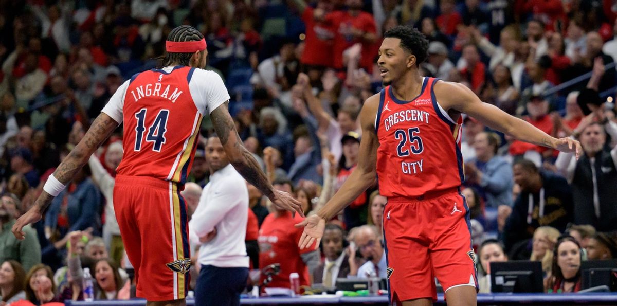 Nov 15, 2024; New Orleans, Louisiana, USA; New Orleans Pelicans forward Brandon Ingram (14) and New Orleans Pelicans guard Trey Murphy III (25) celebrate a three point basket by Murphy against the Denver Nuggets during the first half at Smoothie King Center. Mandatory Credit: Matthew Hinton-Imagn Images