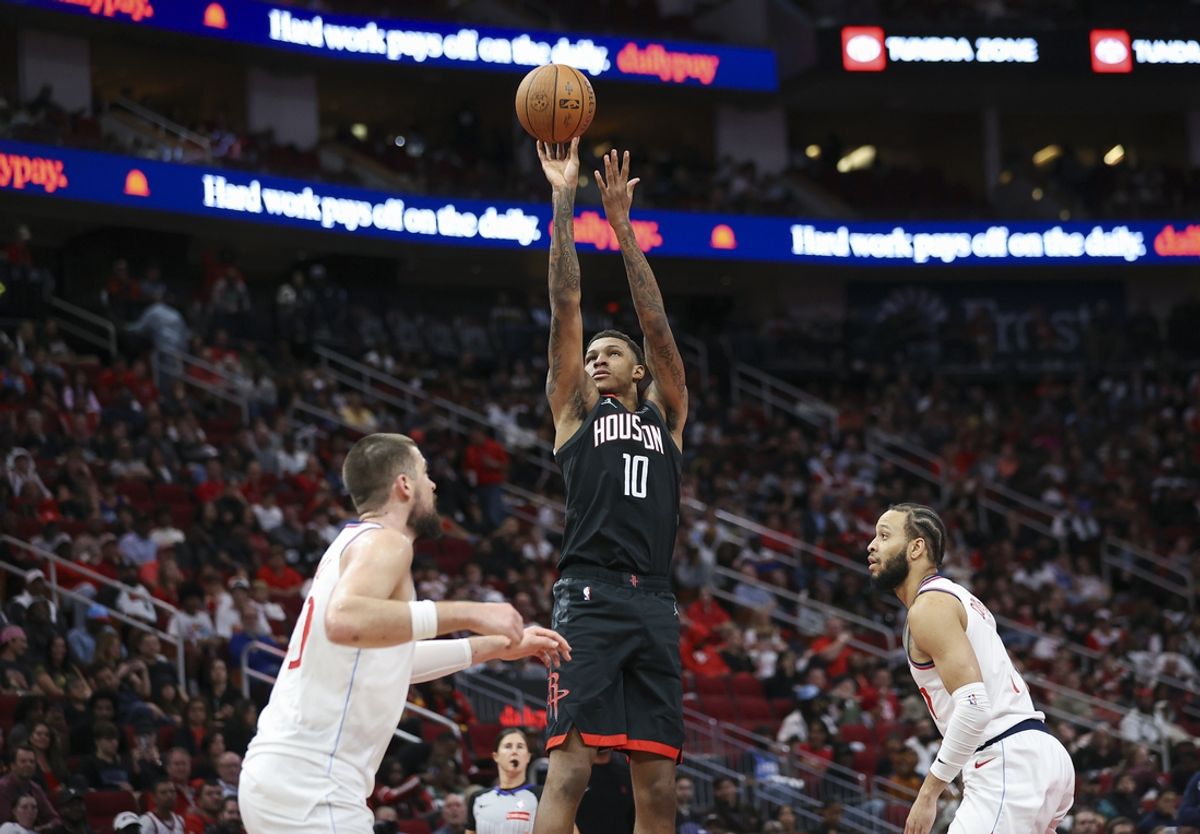 Nov 15, 2024; Houston, Texas, USA; Houston Rockets forward Jabari Smith Jr. (10) shoots the ball during the third quarter against the Los Angeles Clippers at Toyota Center. Mandatory Credit: Troy Taormina-Imagn Images