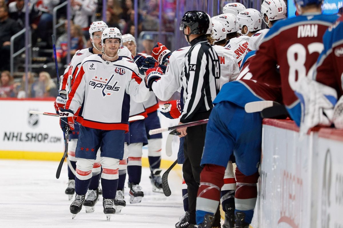 Nov 15, 2024; Denver, Colorado, USA; Washington Capitals center Connor McMichael (24) celebrates with the bench after his second goal of the game against the Colorado Avalanche at Ball Arena. Mandatory Credit: Isaiah J. Downing-Imagn Images