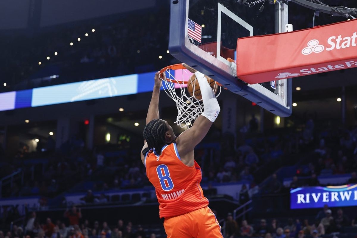 Oklahoma, USA; Oklahoma City Thunder forward Jalen Williams (8) dunks against the Phoenix Suns during the fourth quarter at Paycom Center. Mandatory Credit: Alonzo Adams-Imagn Images