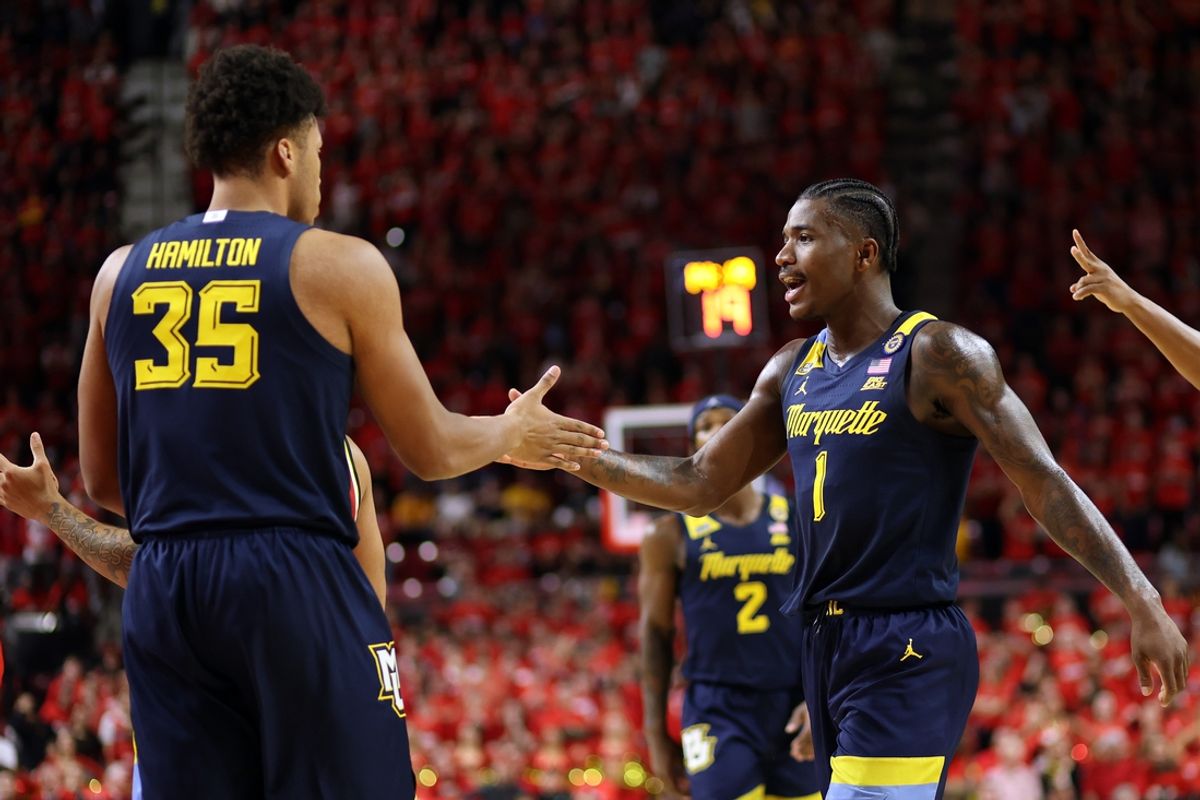 Nov 15, 2024; College Park, Maryland, USA; Marquette Golden Eagles guard Kam Jones (1) celebrates with Marquette Golden Eagles forward Caedin Hamilton (35) during the first half against the Maryland Terrapins at Xfinity Center. Mandatory Credit: Daniel Kucin Jr.-Imagn Images