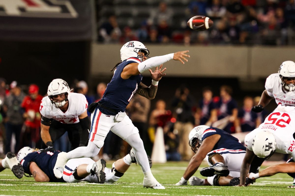 Nov 15, 2024; Tucson, Arizona, USA; Arizona Wildcats quarterback Noah Fifita (11) throws the ball during the first quarter against the Houston Cougars at Arizona Stadium. Mandatory Credit: Aryanna Frank-Imagn Images