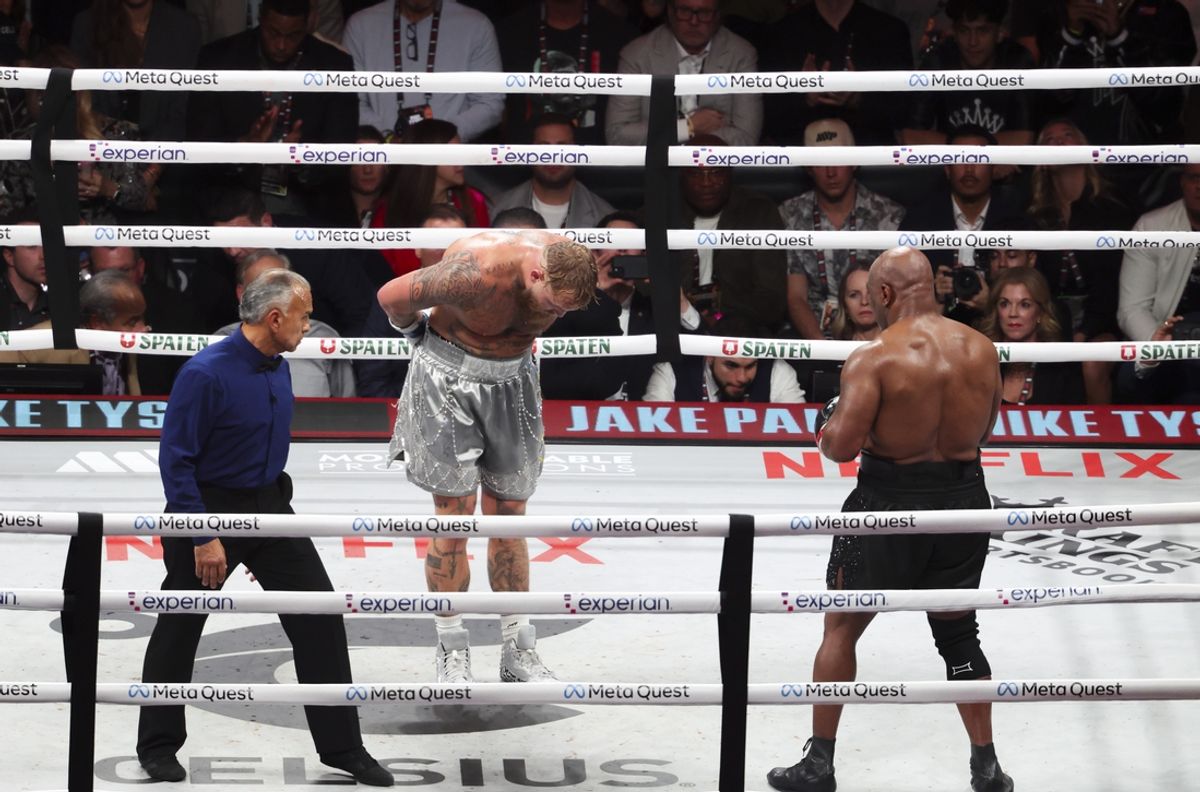 Jake Paul bows down to Mike Tyson as the closing seconds tick off the clock in the final round during their fight at AT&T Stadium. Mandatory Credit: Kevin Jairaj-Imagn Images